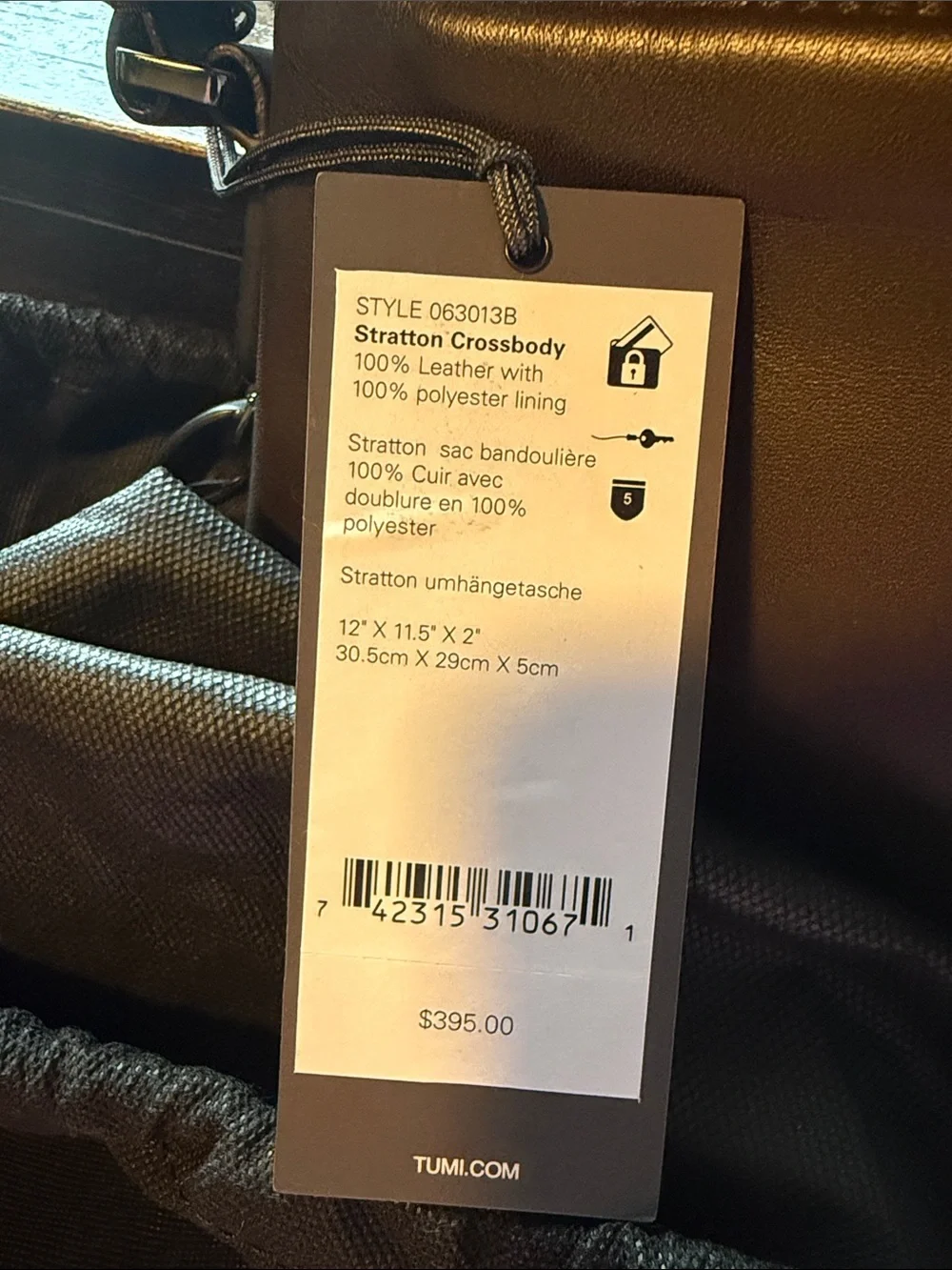 Tumi Dark Brown Leather Messenger Bag with Black Strap